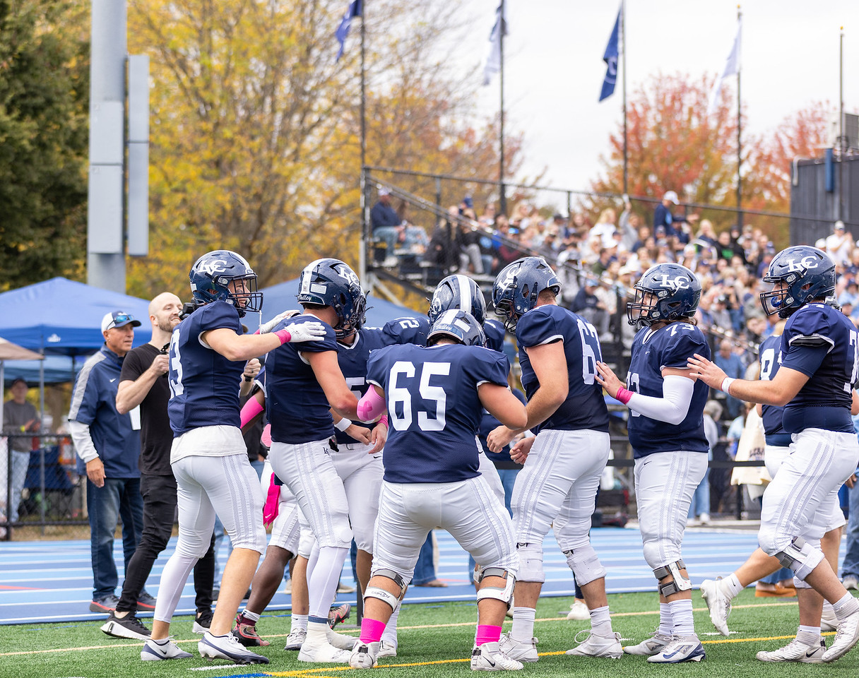 The football team celebrates a touchdown